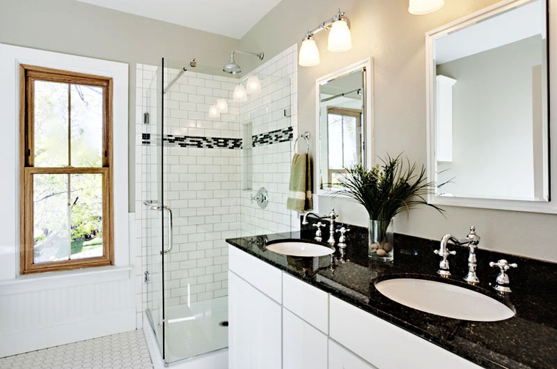 a bathroom with a marble countertop