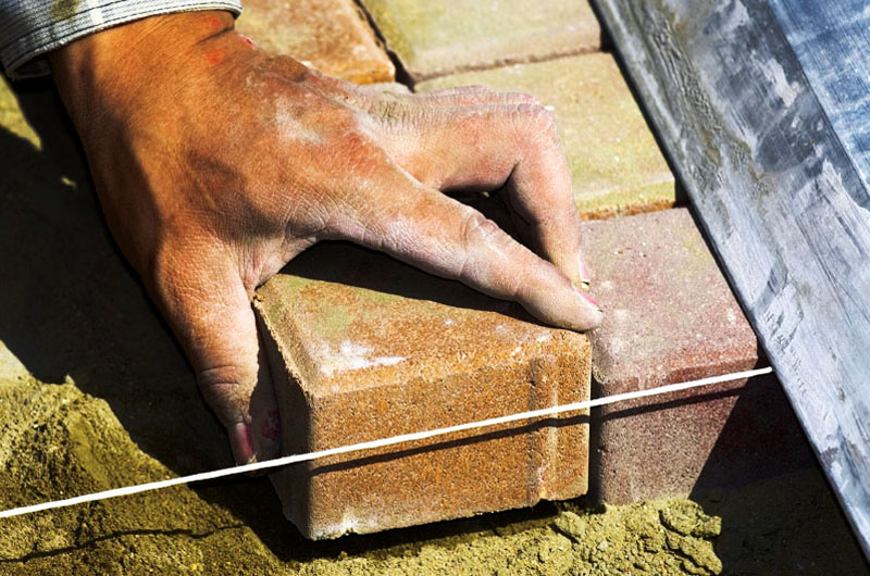 A contractor setting foundation